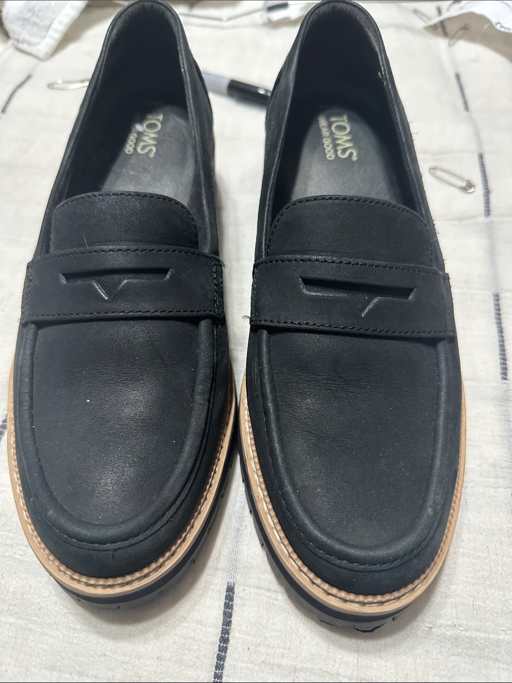 TOMS Black Leather Penny Loafers with Tan Welt